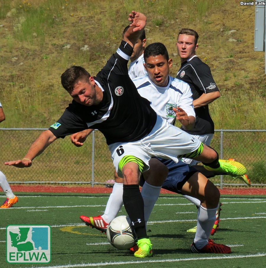 Leo Potts takes a spill. Later he scored both goals as WestSound FC won against Seattle. (David Falk)